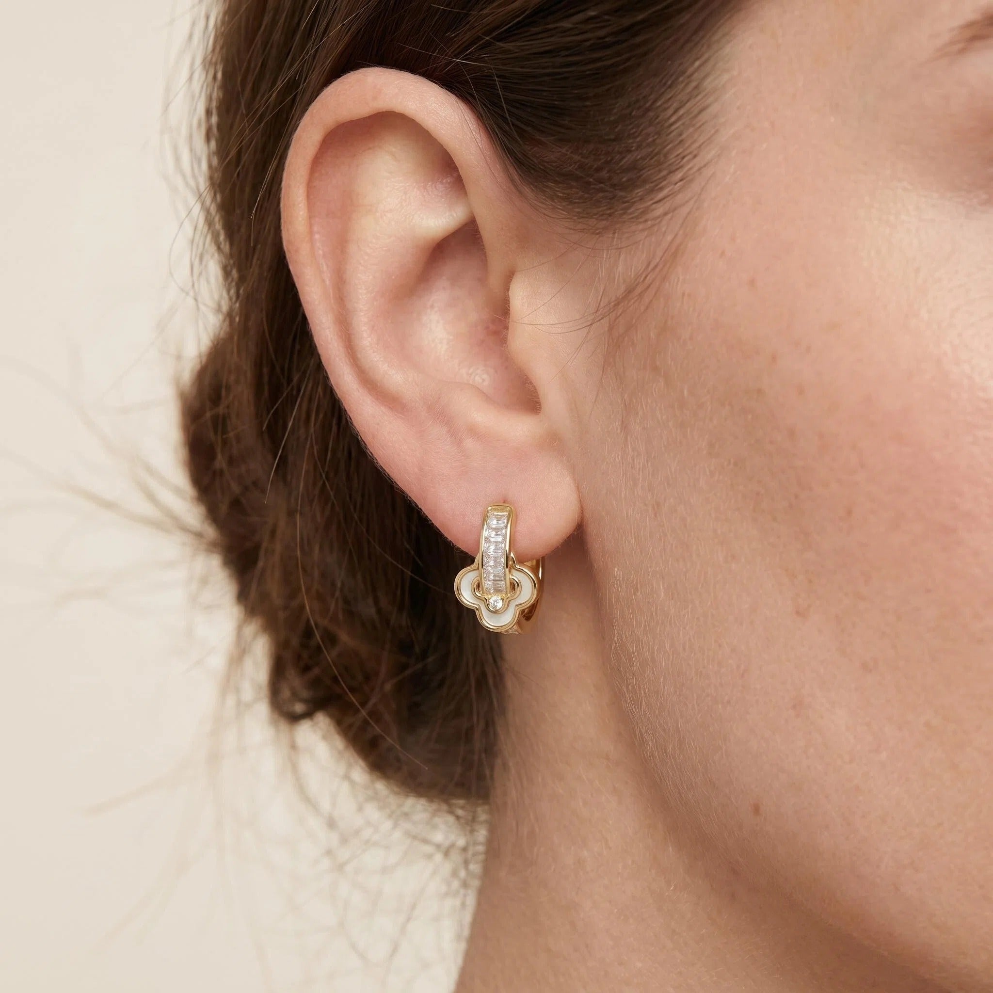 Gold Baguette Zircon Huggie Earrings with White Clover Charm Details