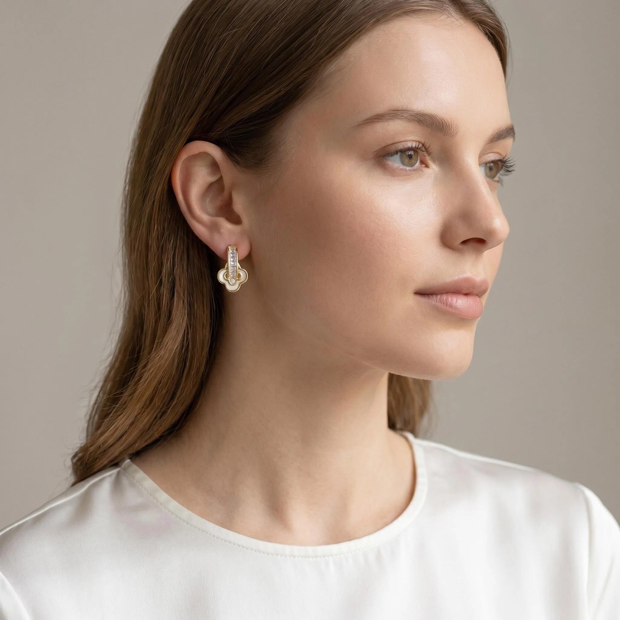 Gold Baguette Zircon Huggie Earrings with White Clover Charm Details